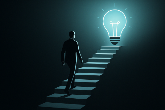 Illustration of a man in a suit climbing stairs toward a glowing lightbulb, symbolizing new ideas and professional growth.