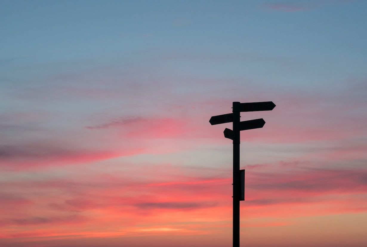 Sunset with road signs